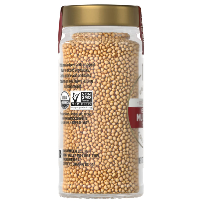 A jar filled with organic yellow mustard seeds from McCormick.