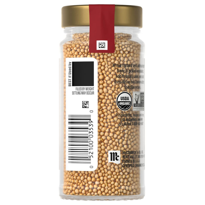 A jar of McCormick Organic Yellow Mustard Seed is shown with its label and barcode.