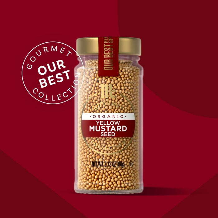 A jar of Whole Grain Mustard Seed from Our Best Collection is displayed against a red background.
