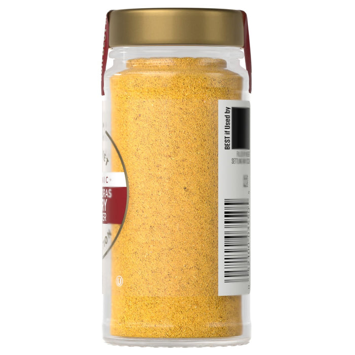A jar of McCormick ground mustard is shown.
