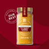 McCormick Gourmet Curry Powder in a glass jar, part of the Our Best Collection.