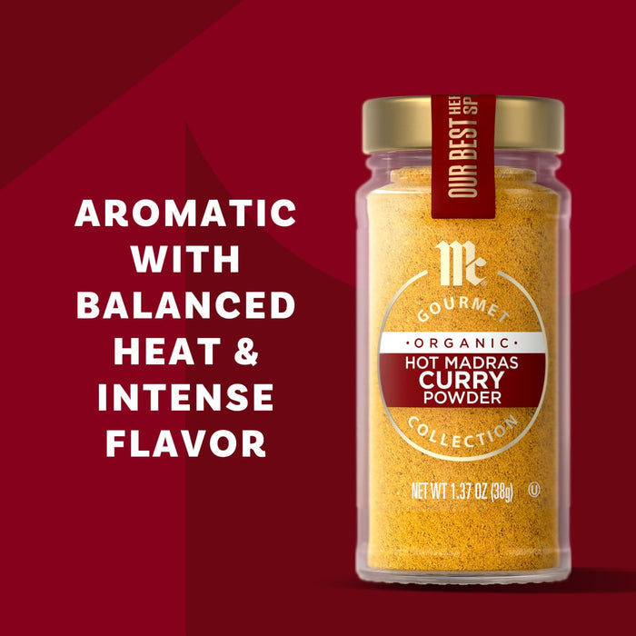 McCormick Gourmet Organic Hot Madras Curry Powder is shown in a jar, highlighting its aromatic, balanced heat, and intense flavor.