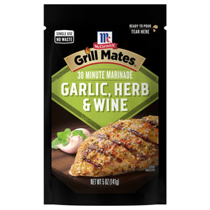 McCormick Grill Mates 30 Minute Marinade Garlic Herb &amp; Wine packaging with a serving suggestion of grilled chicken.