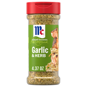A clear plastic bottle of Mccormick Garlic And Herb Pepper Seasoning Ground 4.37 Oz featuring a green label with a picture of seasoned salmon and pasta.