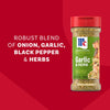 A bottle of Mccormick Garlic And Herb Pepper Seasoning Ground 4.37 Oz is displayed against a red background featuring text that highlights its robust blend of onion, garlic, black pepper, and herbs.