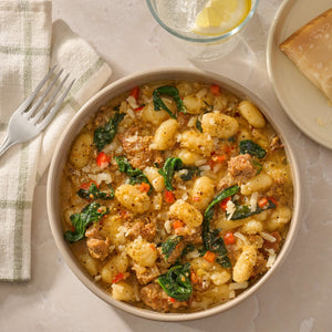 A hearty bowl of gnocchi with sausage and spinach is seasoned with Mccormick Signature Seasoning Savory Garlic Onion Oz for a flavorful meal.