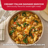 A bowl of creamy Italian sausage gnocchi with spinach and red peppers is seasoned with Mccormick Signature Seasoning Savory Garlic Onion Oz to create a flavorful weeknight meal.