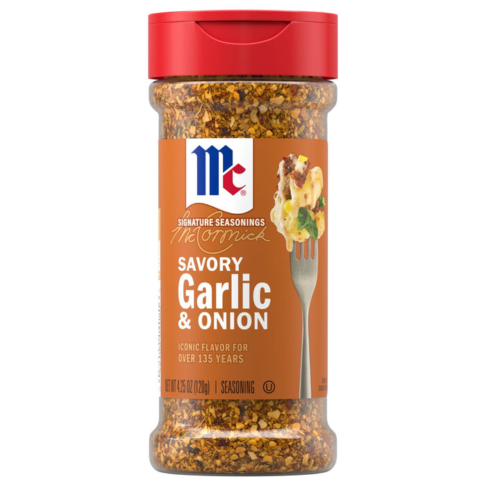A clear bottle with a red cap displays the label for Mccormick Garlic Onion Pepper Seasoning Ground 4.25 Oz, with the coarse seasoning blend visible through the plastic.