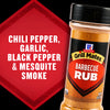 A bottle of McCormick Grill Mates Barbecue Rub, highlighting its chili pepper, garlic, black pepper, and mesquite smoke flavors.