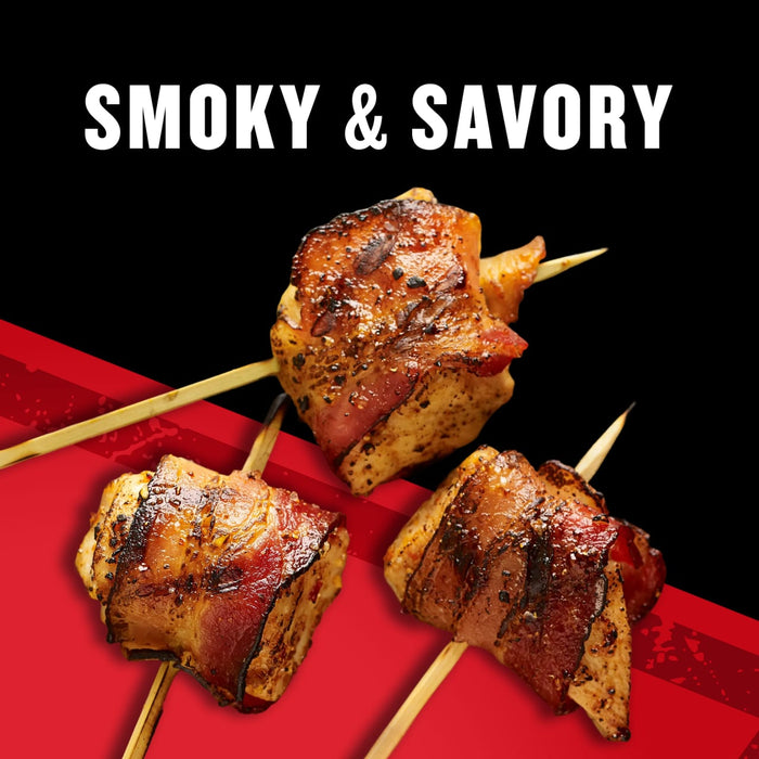 Three skewers of bacon-wrapped chicken bites are displayed against a smoky and savory background.