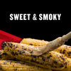 Grilled corn on the cob with a sweet and smoky flavor.