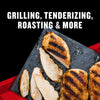 Grilled chicken breasts are displayed on a slate plate, highlighting their versatility for grilling, tenderizing, roasting, and more.