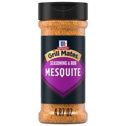 A bottle of Mccormick Grill Mates Mesquite Seasoning Rub 4.87 Oz features a bold purple label and a black cap over the coarse spice blend.