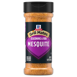 A clear plastic bottle of Mccormick Grill Mates Mesquite Seasoning Rub 4.87 Oz featuring a bold purple label and a black flip-top lid.