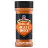 A bottle of Mccormick Grill Mates Sweet And Smoky Seasoning Rub 5.37 Oz featuring a black label with an orange shield design and a black flip-top lid.