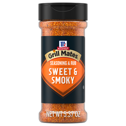 A bottle of Mccormick Grill Mates Sweet And Smoky Seasoning Rub 5.37 Oz featuring a black label with an orange shield design and a black flip-top lid.