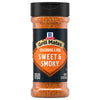 A clear plastic bottle of Mccormick Grill Mates Sweet And Smoky Seasoning Rub 5.37 Oz featuring a black and orange label with the iconic McCormick logo.