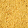A close-up of a yellow powder possibly a spice or seasoning.