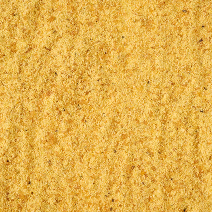 A close-up of a yellow powder possibly a spice or seasoning.
