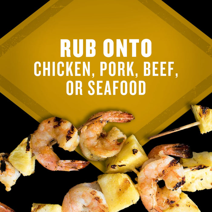 A culinary image suggesting the product can be rubbed onto chicken, pork, beef, or seafood, featuring grilled shrimp and pineapple skewers.