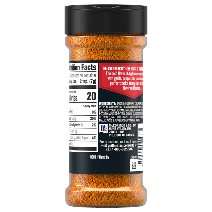 The back label of Mccormick Grill Mates Applewood Seasoning Rub 6 Oz displays nutrition facts and a list of ingredients including chili pepper, demerara sugar, and apple cider vinegar solids.