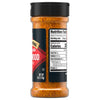 A side view of a bottle of Mccormick Grill Mates Applewood Seasoning Rub 6 Oz showing the nutrition facts label and the orange-brown spice blend inside.