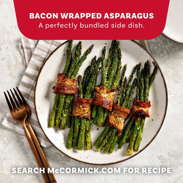 A plate of bacon wrapped asparagus bundles seasoned with Mccormick Himalayan Pink Salt Pepper And Garlic Seasoning Ground 6.5 Oz as a perfectly bundled side dish.