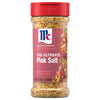 A clear shaker bottle of Mccormick Himalayan Pink Salt Pepper And Garlic Seasoning Ground 6.5 Oz is shown against a white background, highlighting the coarse texture of the seasoning blend inside.