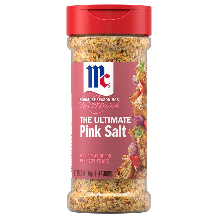 A clear shaker bottle of Mccormick Himalayan Pink Salt Pepper And Garlic Seasoning Ground 6.5 Oz is shown against a white background, highlighting the coarse texture of the seasoning blend inside.