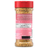 A clear plastic bottle of Mccormick Himalayan Pink Salt Pepper And Garlic Seasoning Ground 6.5 Oz, showing the back label with nutritional facts, ingredients, and serving suggestions.