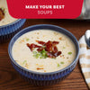 A bowl of creamy potato soup garnished with green onions and bacon bits is seasoned with Mccormick Himalayan Pink Salt Pepper And Garlic Seasoning Ground 6.5 Oz under a banner that says Make Your Best Soups.