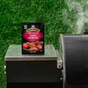 A box of McCormick Grill Mates Brown Sugar Bourbon seasoning sits on a grill.