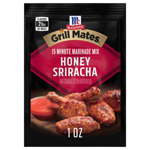 A package of McCormick Grill Mates Honey Sriracha 15 Minute Marinade Mix is displayed, showcasing seasoned chicken pieces.