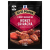 A package of McCormick Grill Mates Honey Sriracha 15 Minute Marinade Mix is displayed, showcasing seasoned chicken pieces.