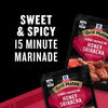 A package of McCormick Grill Mates Sweet and Spicy 15 Minute Marinade Honey Sriracha.