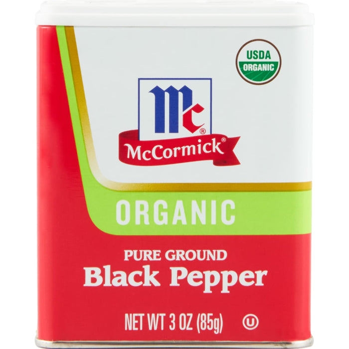 A McCormick brand tin of organic pure ground black pepper.