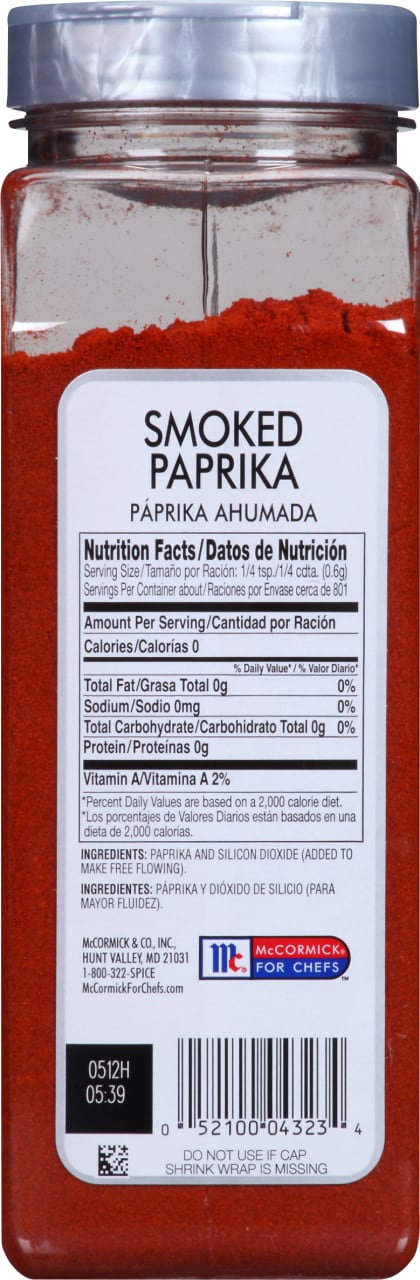 A McCormick for Chefs Smoked Paprika spice jar with nutrition facts and ingredients listed on the label.