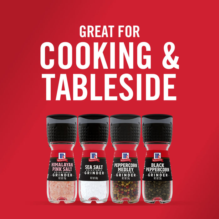 Four McCormick grinder bottles with different spices: Himalayan Pink Salt Sea Salt Peppercorn Medley and Black Peppercorn.