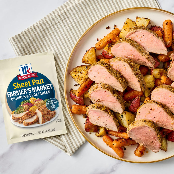 McCormick Sheet Pan Farmers Market Pork Tenderloin and Vegetables meal is displayed on a plate.
