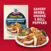 McCormick Sheet Pan Farmer's Market Chicken &amp; Vegetables seasoning mix is shown with a prepared dish featuring savory herbs, onions, and bell peppers.