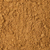 A close-up of finely ground, light brown powder.