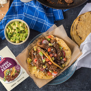 A delicious Carne Asada taco is displayed with fresh toppings and ingredients, showcasing the product's versatility.