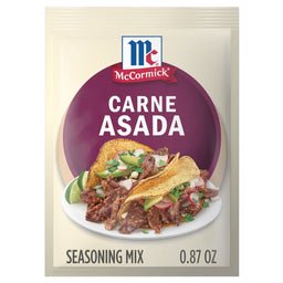 A packet of McCormick Carne Asada Seasoning Mix is displayed, featuring a photo of carne asada tacos.