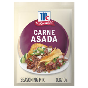 A packet of McCormick Carne Asada Seasoning Mix is displayed, featuring a photo of carne asada tacos.