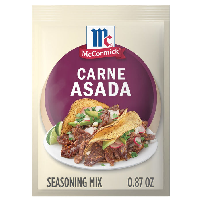 A packet of McCormick Carne Asada Seasoning Mix is displayed, featuring a photo of carne asada tacos.