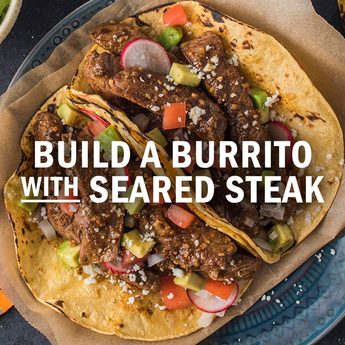 A burrito with seared steak is shown, highlighting the ingredients and the build-your-own concept.