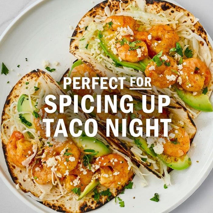 These shrimp tacos with avocado and cheese are perfect for spicing up taco night.