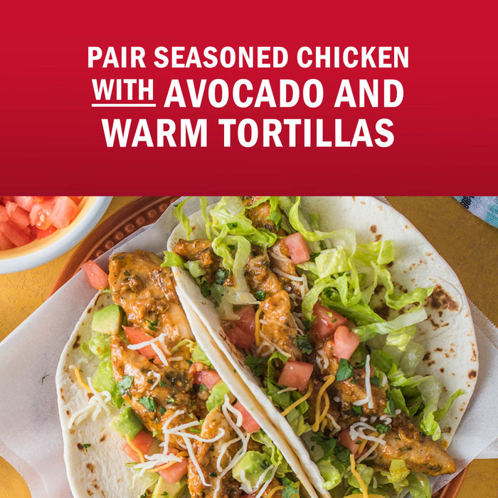 A delicious taco featuring seasoned chicken, avocado, and warm tortillas.