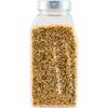 A clear shaker bottle filled with Everything Bagel seasoning.