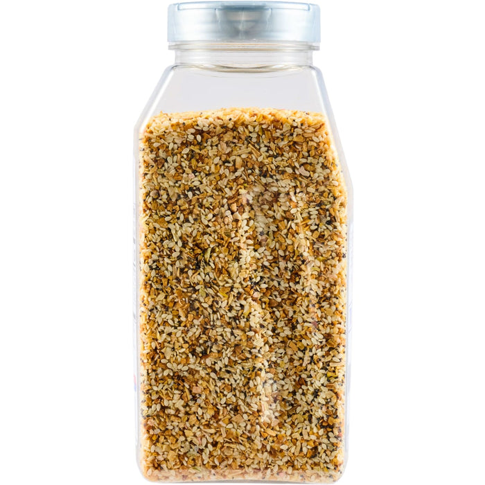 A clear shaker bottle filled with Everything Bagel seasoning.